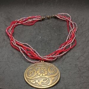 Red and Purple Beaded Necklace with Ornate Pendant